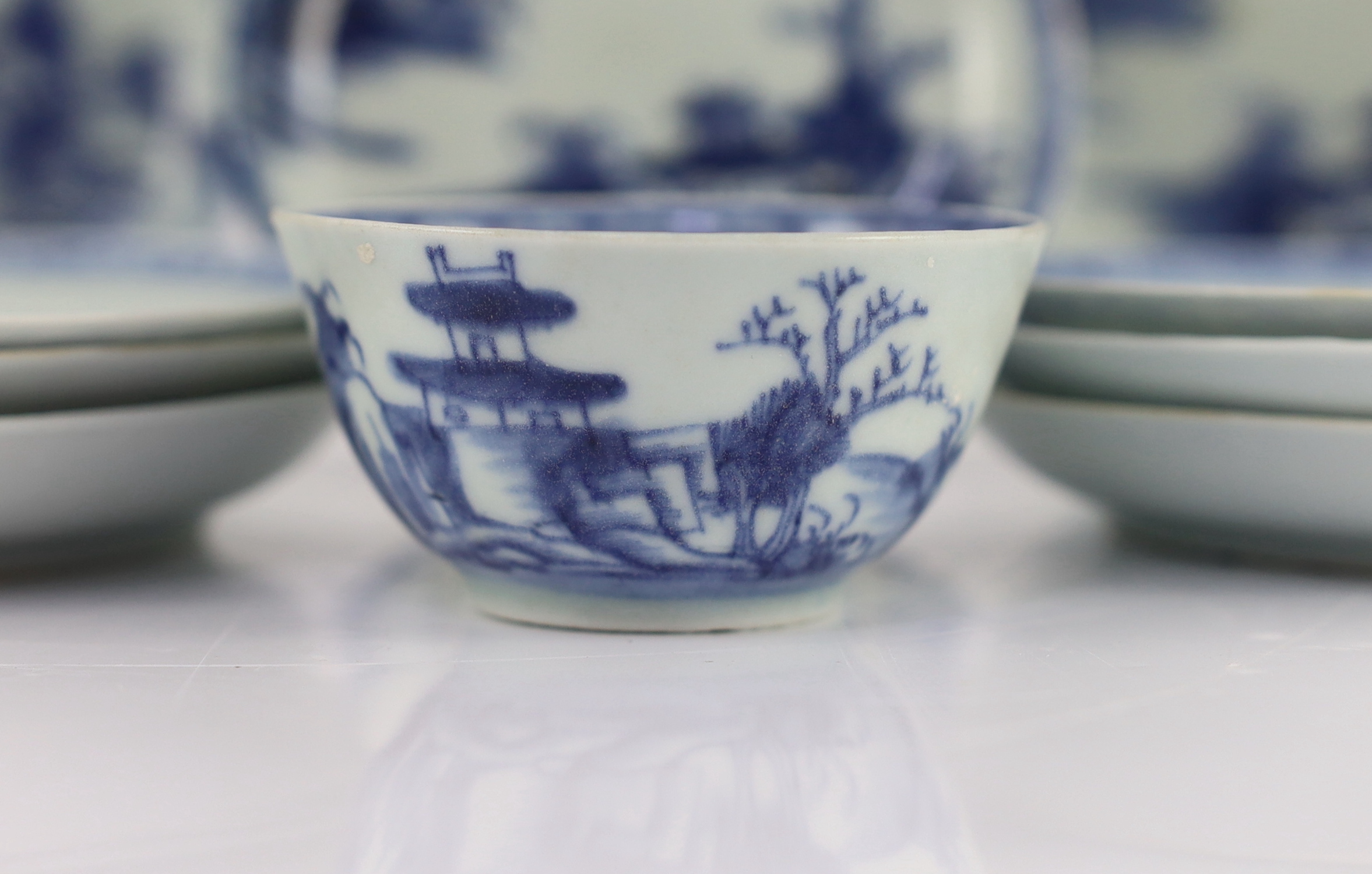 Twelve Chinese blue and white ‘Pagoda Riverscape’ tea bowls and saucers, Nanking Cargo, c.1750